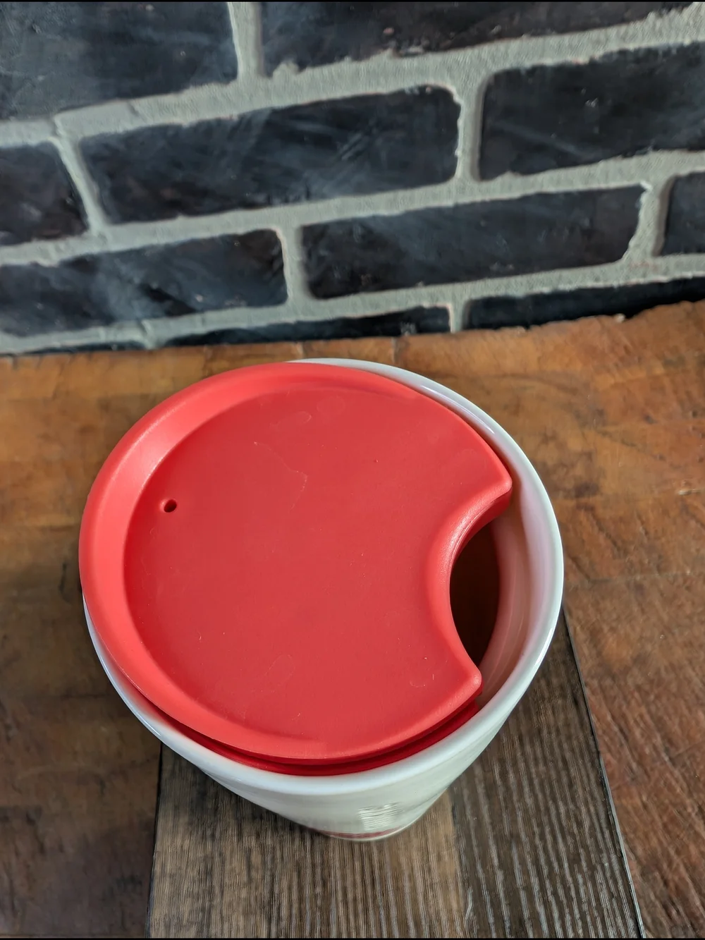 Starbucks White Ceramic Travel Mug with Coral Lid and Pinecone Accent